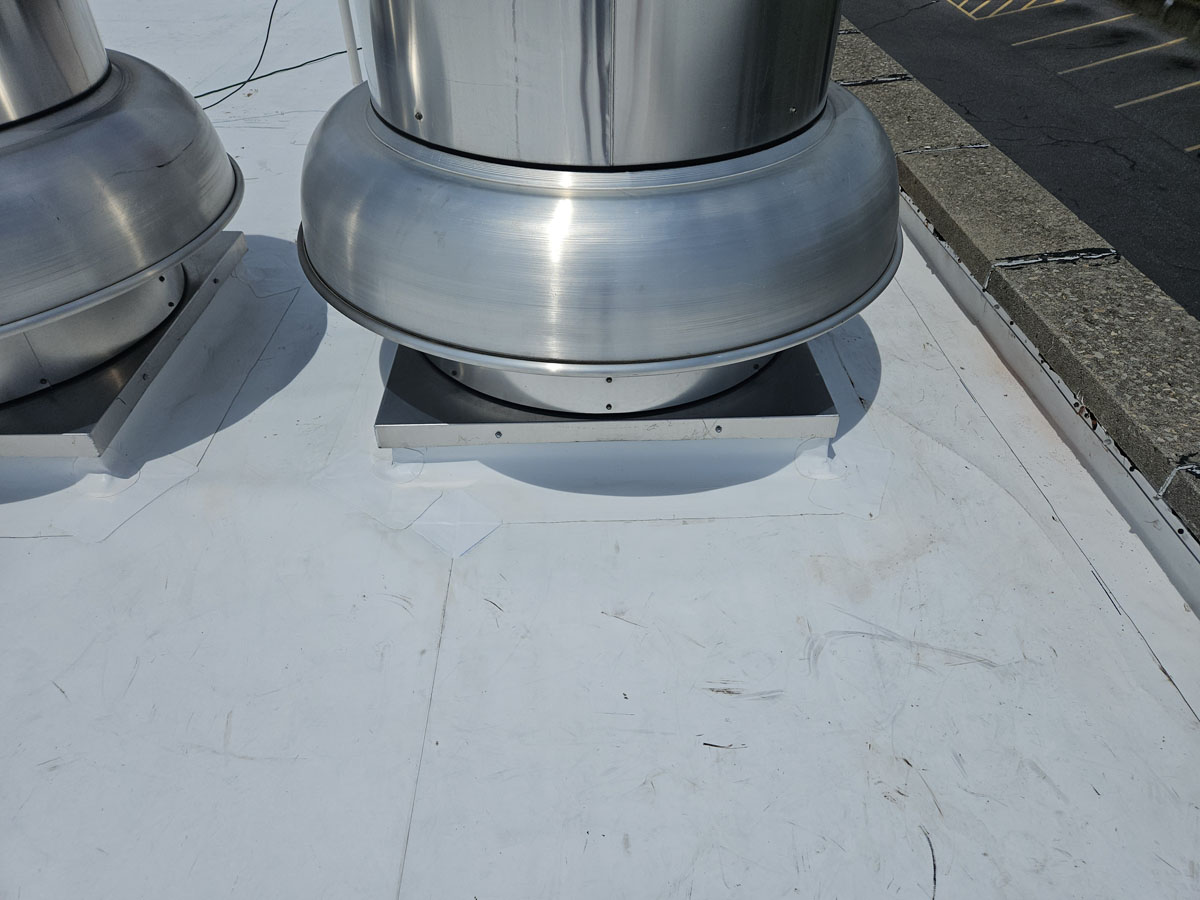 Completed rebuilt vent curb flashed with Elevate TPO membrane on Roof 1 at 150 E Wolfe St