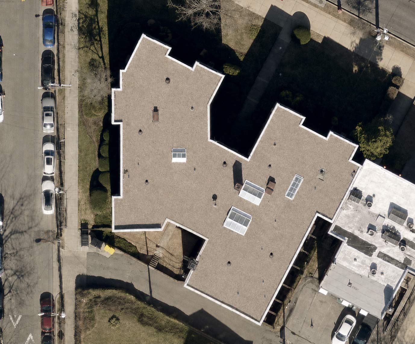 Overhead drone view of the completed ballasted TPO roof on the apartment building at 2801 Pennsylvania Ave SE, Washington DC